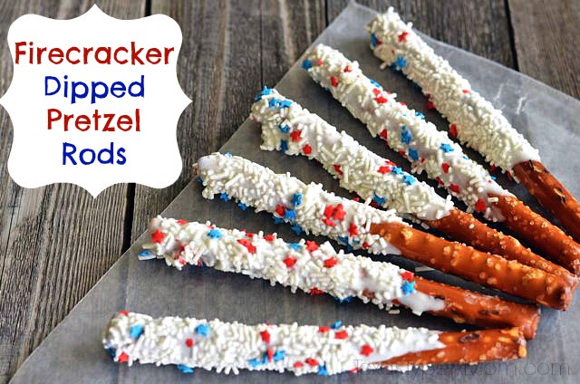 Red, white, and blue recipe! Get festive this 4th of July with Patriotic Firecracker Dipped Pretzel Rods. This easy dessert has the perfect balance of salty and sweet. 