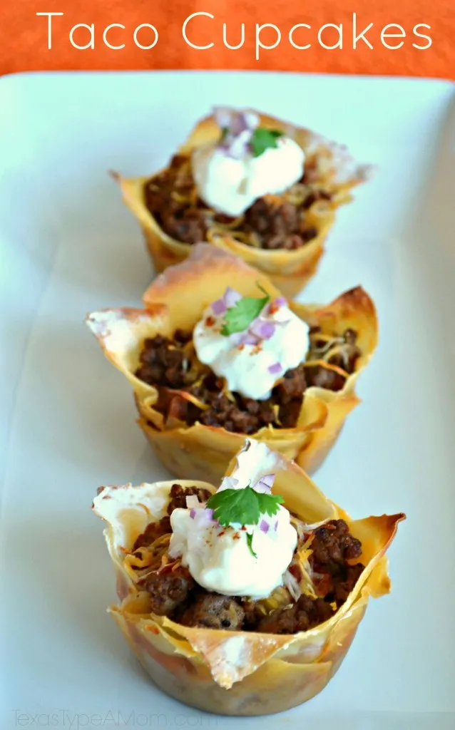 This savory, bite-sized appetizer Taco Cupcakes recipe makes the perfect appetizer for football season or a main dish for any occasion. All the flavors you love from tacos made wrapped in wonton wrappers for an easy to eat appetizer. #tacos #tacocupcakes #tacorecipes #beefrecipes #groundbeefrecipes #kidfriendlyrecipes #appetizers #appetizerrecipes #texmex #cincodemayo #wontonwrappers