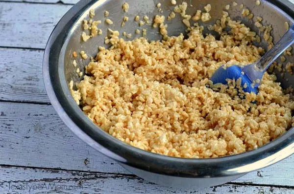 Step 5 Rice Krispies Mixing with Marshmallow Mix #shop #EatMoreBites