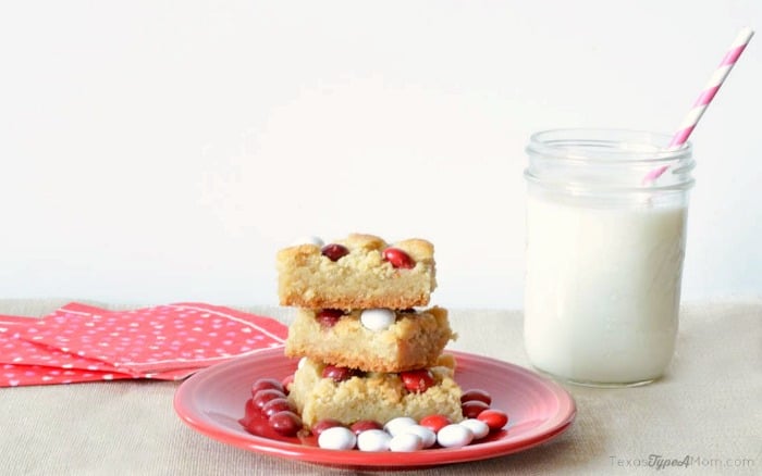 M&M's Red Velvet Sugar Cookie Bars recipe. The perfect dessert for Valentine's Day or anytime!