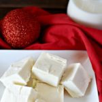 Forget milk and cookies. Give Santa what he really wants with this Easy Eggnog Recipe. Rich, creamy and a delicious alternative to cookies...again. #recipes #recipe #christmas #holiday #christmasrecipes #christmasdesserts #desserts #dessertrecipes #eggnog #eggnogrecipes #eggnogeasy #fudge #easyfudge #fudgerecipes #eggnogfudge