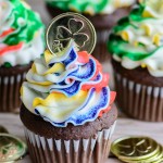 Looking for an eye catching dessert recipe for St Patrick's Day? Check out these Easy Chocolate Cupcakes Recipe from Scratch + Rainbow Buttercream Frosting
