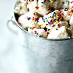 Traditional puppy chow (or muddy buddies depending on what part of the country you're from) is so boring. This puppy chow recipe gets more flavorful and delicious with the addition of funfetti cake batter and this SECRET ingredient!
