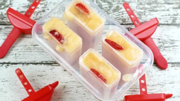 Summer is officially here! To cleebrate (and cool off just a bit), try making this easy homemade Strawberry Cantaloupe Popsicles recipe! This is such a great way to allow kids to help in the kitchen and enjoy a healthy snack afterwards! 