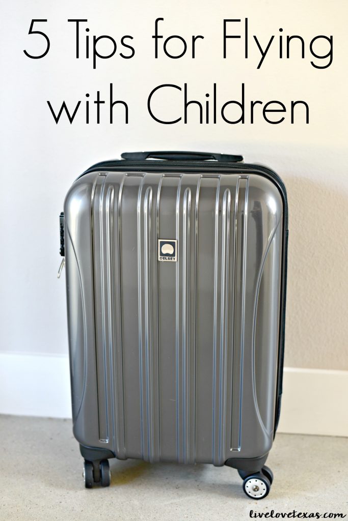 Traveling with kids doesn't have to be scary. Check out these 5 Tips for Flying with Children!