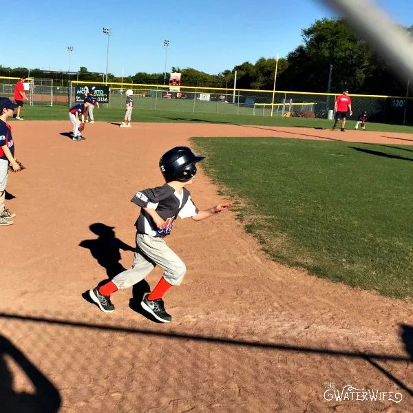 My sweet little tee ball player is growing up despite my objections!