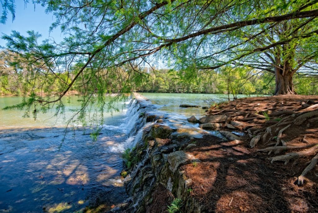 You don't have to travel far to cool down this summer with this collection of the 9 Best Central Texas Waterfalls located within an hour of the greater Austin area. City parks, state parks, and everything in between!