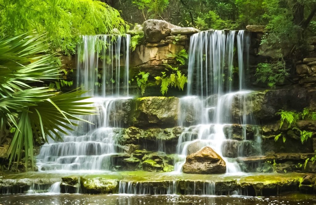 You don't have to travel far to cool down this summer with this collection of the 9 Best Central Texas Waterfalls located within an hour of the greater Austin area. City parks, state parks, and everything in between!