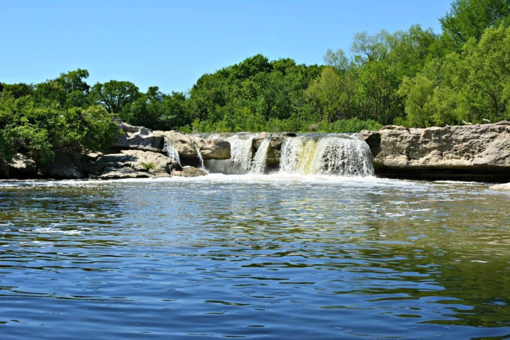 You don't have to travel far to cool down this summer with this collection of the 9 Best Central Texas Waterfalls located within an hour of the greater Austin area. City parks, state parks, and everything in between!