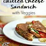 Recipes that save time and money don't have to be boring. Look no further than this Crispy & Simple Grilled Cheese Sandwich with Veggies recipe. #kidfriendlyrecipes #vegetarianrecipes #sandwichrecipes #sandwiches #grilledcheeserecipes #quickdinnerrecipes #familyrecipes #cheeserecipes