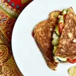Recipes that save time and money don't have to be boring. Look no further than this Crispy & Simple Grilled Cheese Sandwich with Veggies recipe. #kidfriendlyrecipes #vegetarianrecipes #sandwichrecipes #sandwiches #grilledcheeserecipes #quickdinnerrecipes #familyrecipes #cheeserecipes