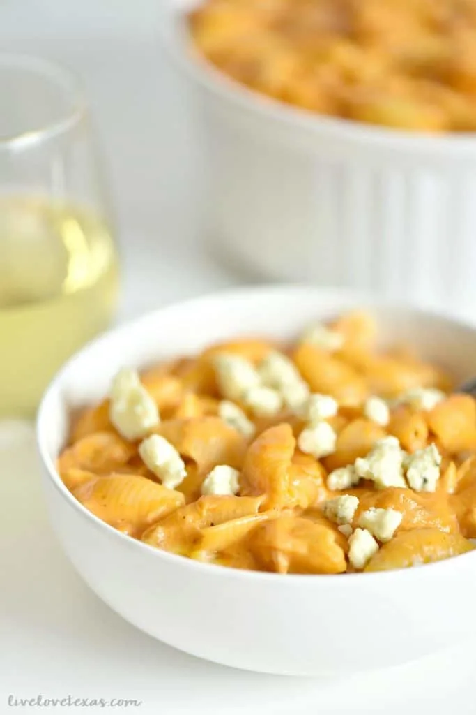 This recipe for Buffalo Chicken Mac & Cheese Casserole uses my easy creamy mac and cheese recipe as a base and combines it with rotisserie chicken and your favorite buffalo wing sauce in one amazing dish!