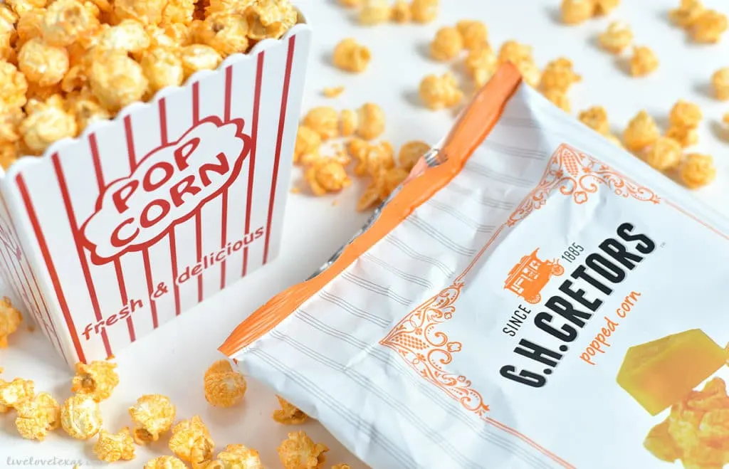 popcorn bucket with popcorn bag spilled