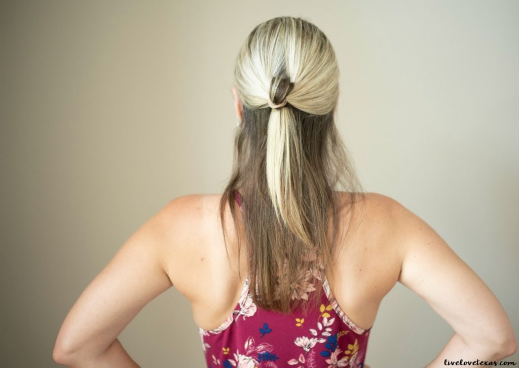 This fast and easy half up half down hairstyle tutorial is so simple and works on medium to long hair. It's a super versatile look that can be dressed up or down with just a ponytail holder and bobby pins.