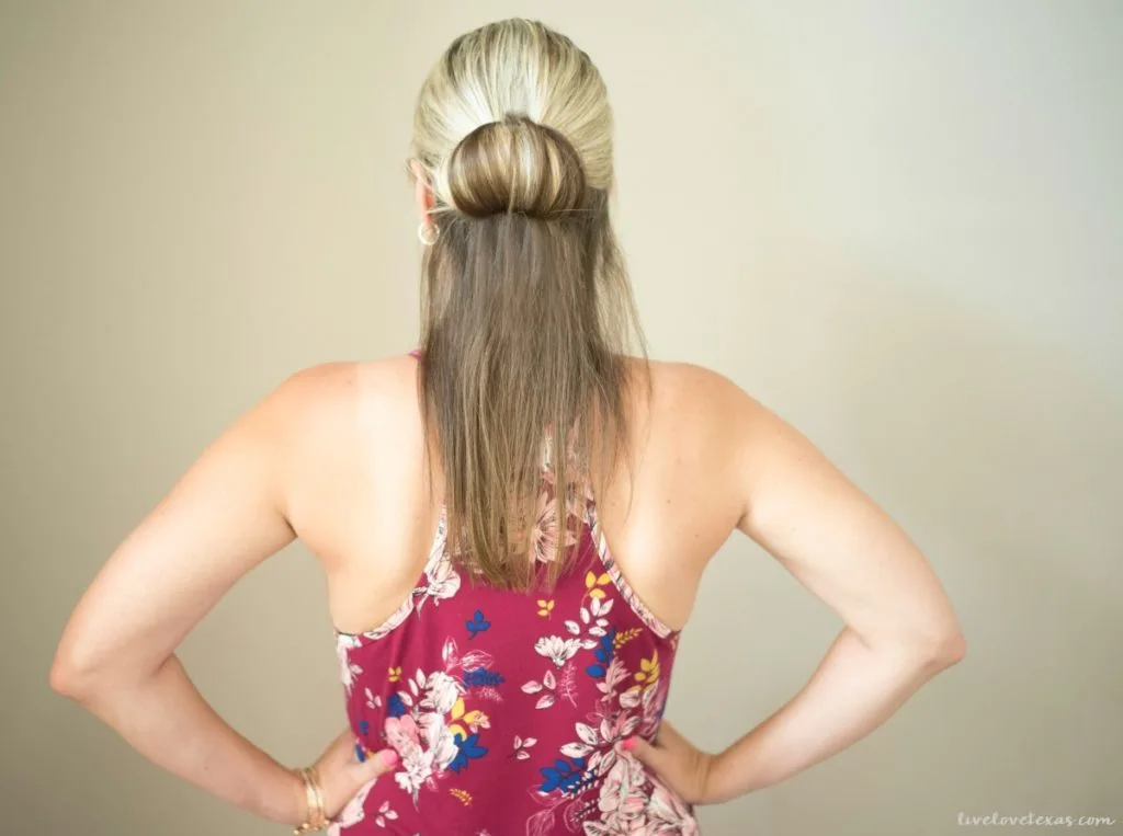 This fast and easy half up half down hairstyle tutorial is so simple and works on medium to long hair. It's a super versatile look that can be dressed up or down with just a ponytail holder and bobby pins.