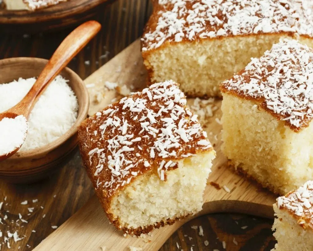 This Simple & Sweet Coconut Almond Bread recipe uses 10 basic ingredients you already have in your kitchen and makes the most heavenly smell that will instantly transport you to the tropics.