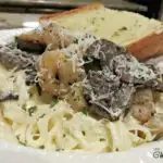 Mouthwatering and creamy restaurant style pasta that can be thrown together in under 30 minutes? It sounds too good to be true, but it&rsquo;s not with this quick and easy Shrimp and Mushroom Fettuccine Alfredo recipe. Wow your guests or just simplify dinner for your family.