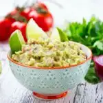 This is the very best homemade guacamole recipe you'll find. Avocados, tomatoes, onions, peppers, cilantro, and lime magically come together to form a guacamole recipe easy and quick dip perfect for any Mexican recipe. If you're looking for a guac recipe that's better than restaurants and will leave you licking the bowl, this is the one for you!