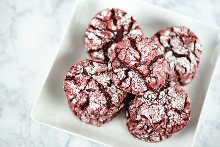 These delightful red velvet crinkle cookies are made with boxed cake mix. So there is less measuring, less fuss, and more time for laughing and eating cookies.