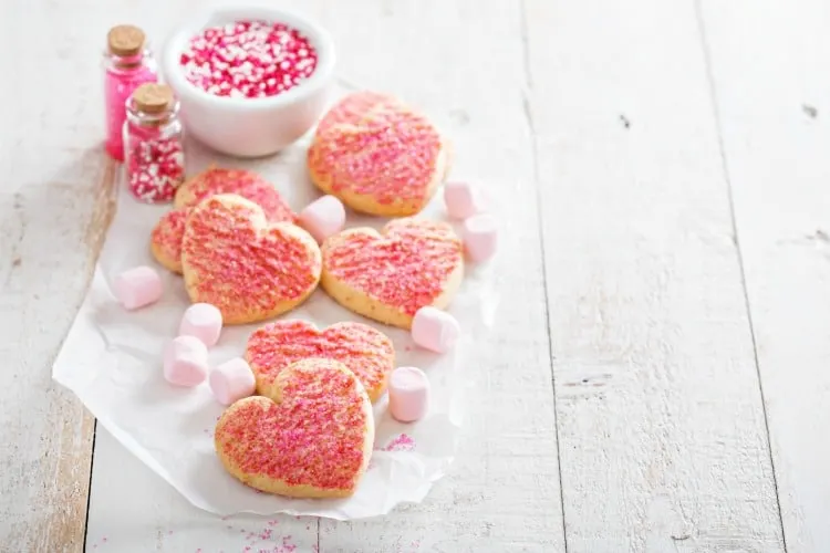 Valentines day heart shaped cookies with pink sprinkles