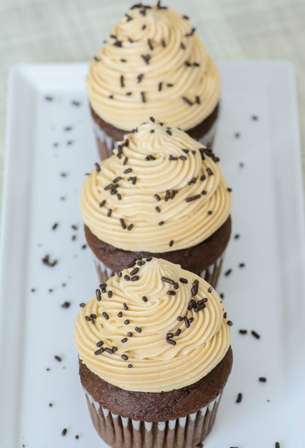 Boozy cupcakes with Bailey's Buttercream Frosting on plate.