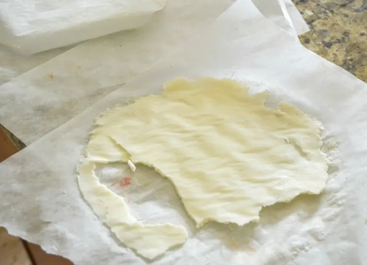 Frozen buttercream frosting layers.