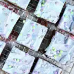 Easy homemade unicorn brownies with pastel frosting.