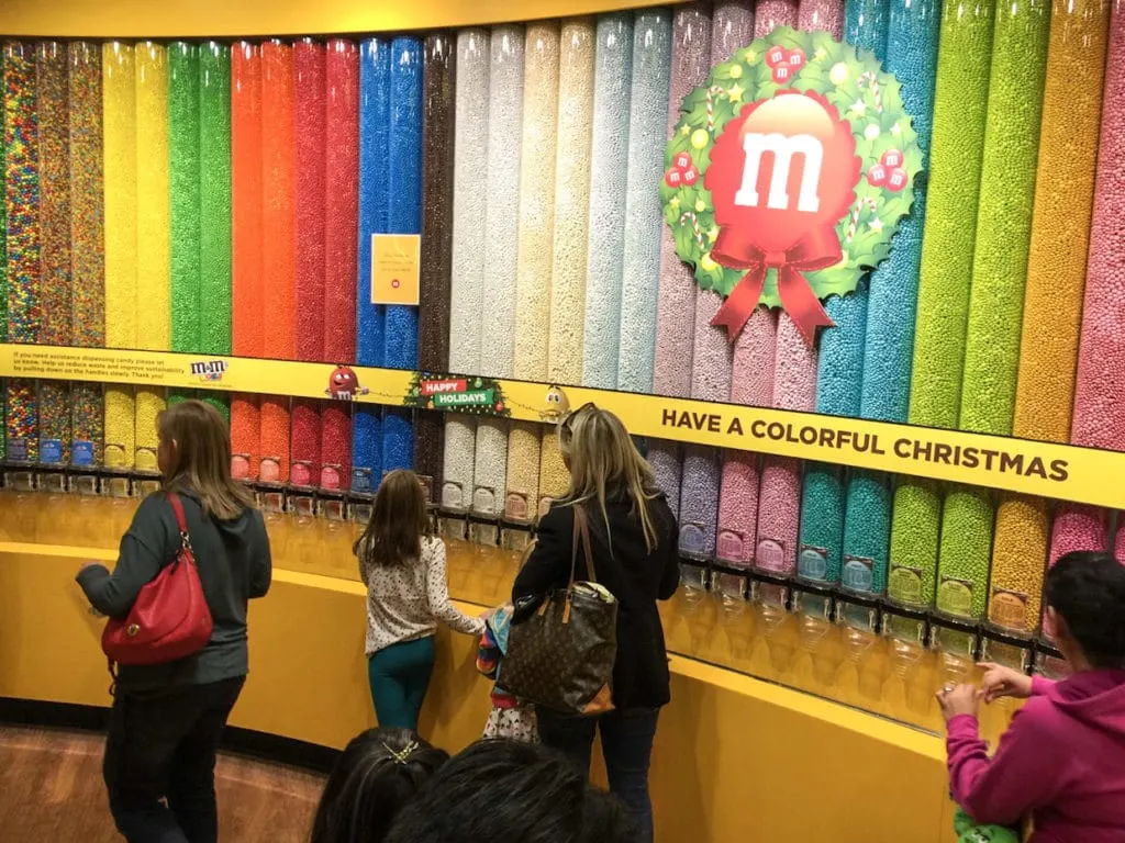 Shopping different colored candies at M&M World in Las Vegas