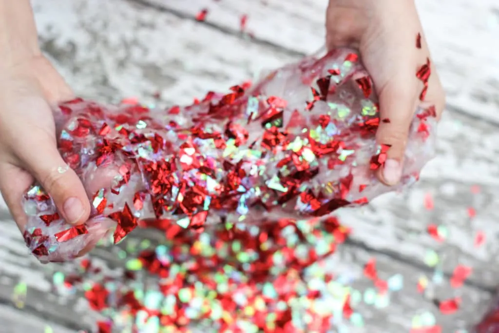 Clear slime with red confetti mixed in. Learn how to make confetti slime. 