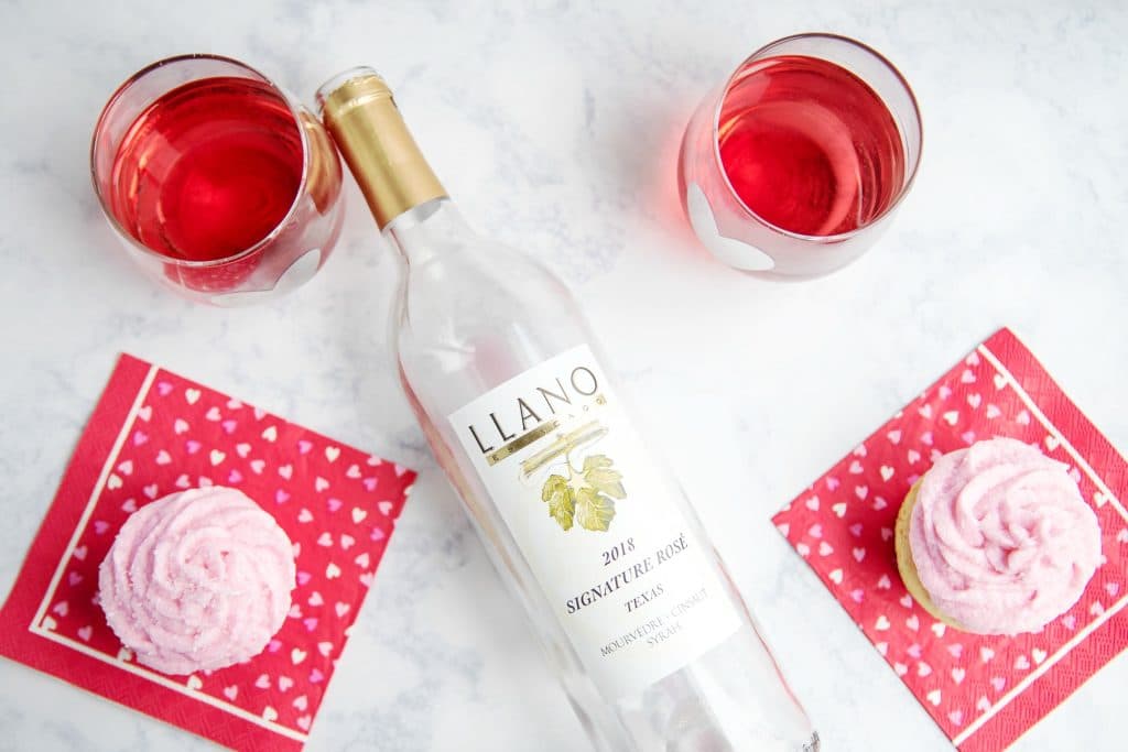 Llano Rosé bottle with glasses of wine and Rosé Cupcakes with Rosé Buttercream