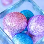 glitter decorated Easter eggs in glass jar