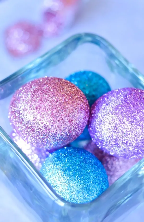 glitter decorated Easter eggs in glass jar