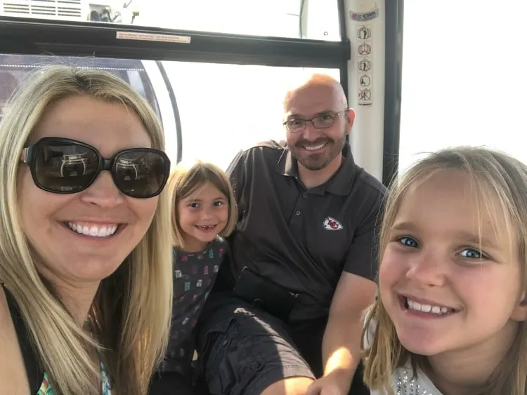 Family riding the Great Wheel in Seattle.