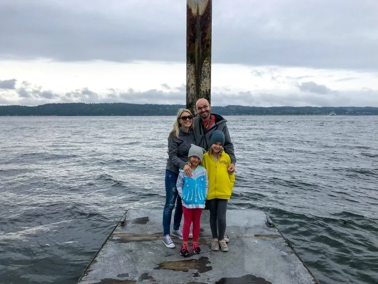 Family on dock outside the Mulkiteo Lighthouse.