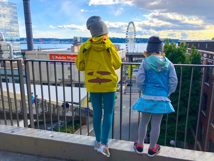 Girls looking at water in Seattle, Washington.