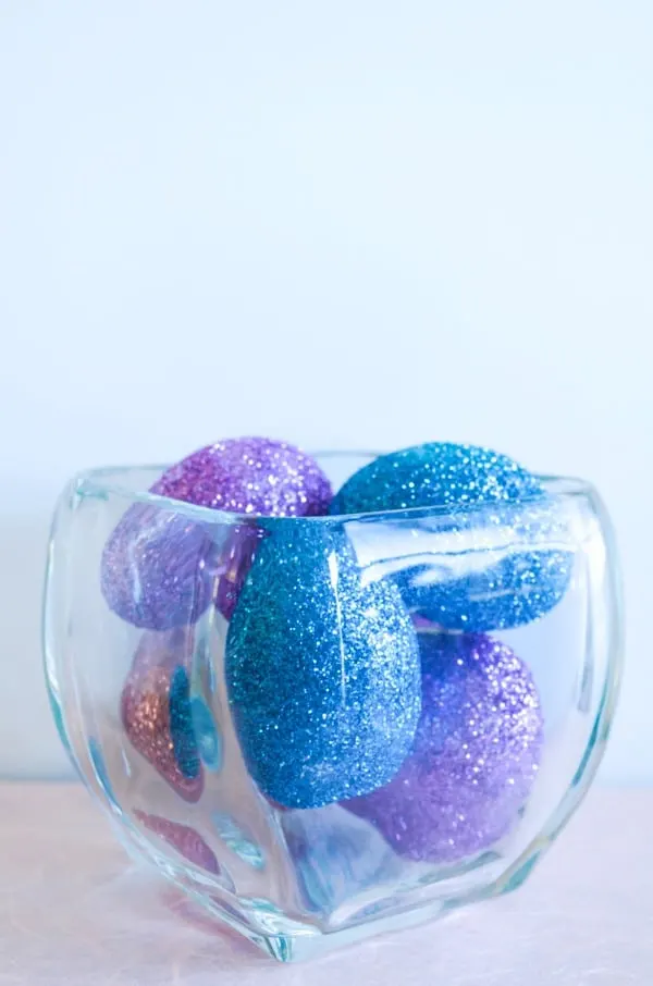 glittered easter eggs in glass jar