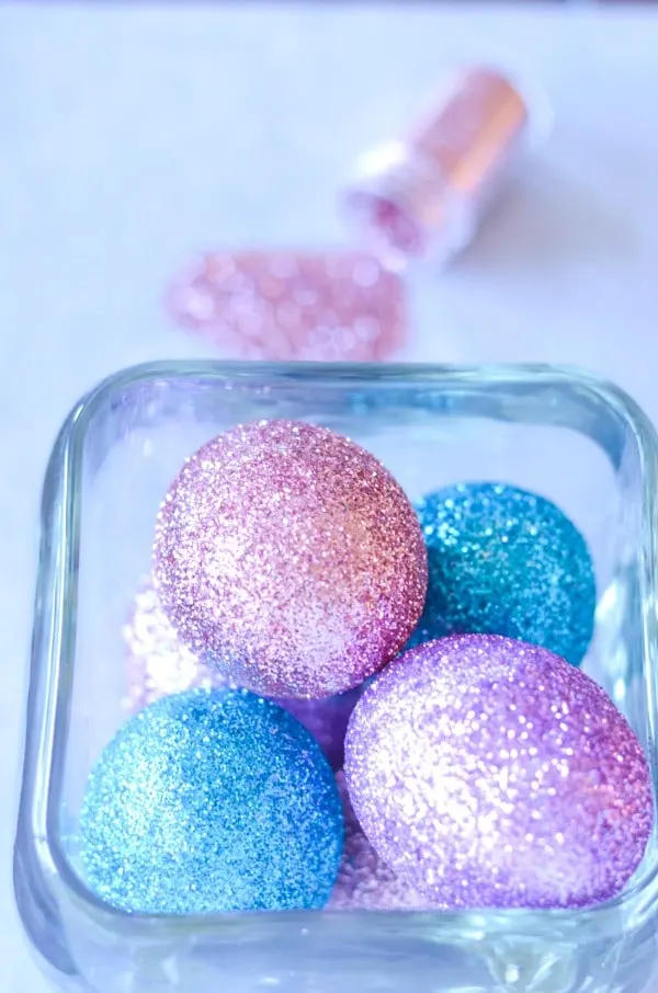 Glittered eggs in glass jar