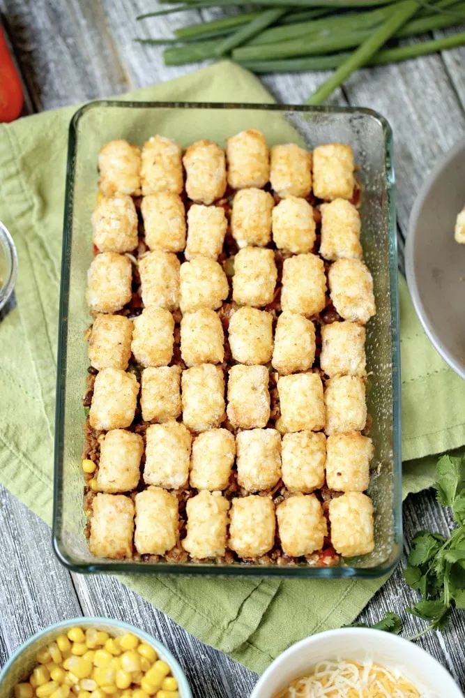 Tater tot taco casserole single layer in baking dish