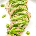 Grilled chimichurri chicken sliced and plated