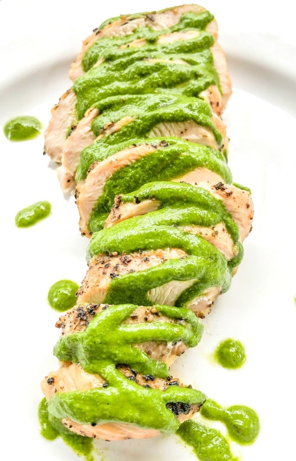 Grilled chimichurri chicken sliced and plated