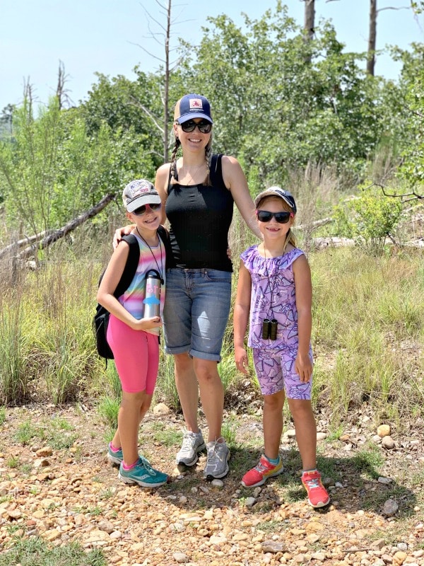 Mom and daughters hiking in Bastrop State Park after the Bastrop Fire
