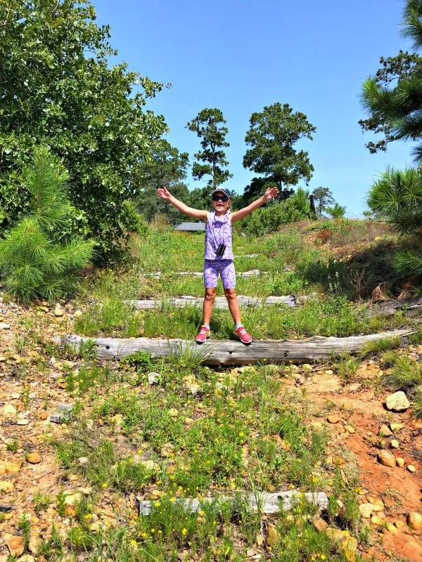 Girl hiking at Bastrop State Park