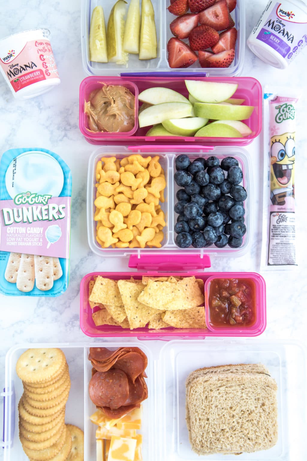 Lunch Box Ideas for Kids - sandwiches, meat and cheese, crackers, pickles, fruits, and yogurt