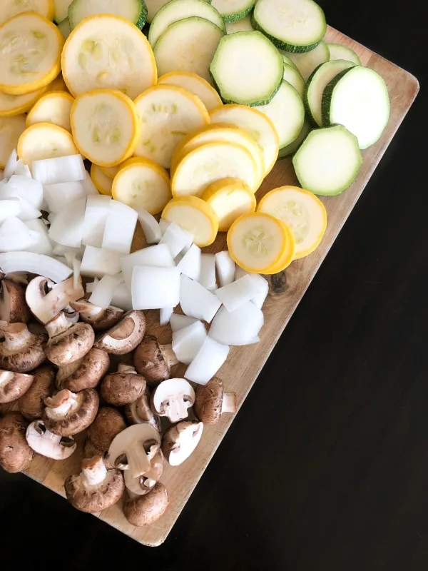 chopped vegetables on cutting board before roasting