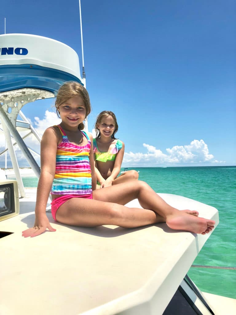 Two girls on charter boat in Panama City Beach Florida.