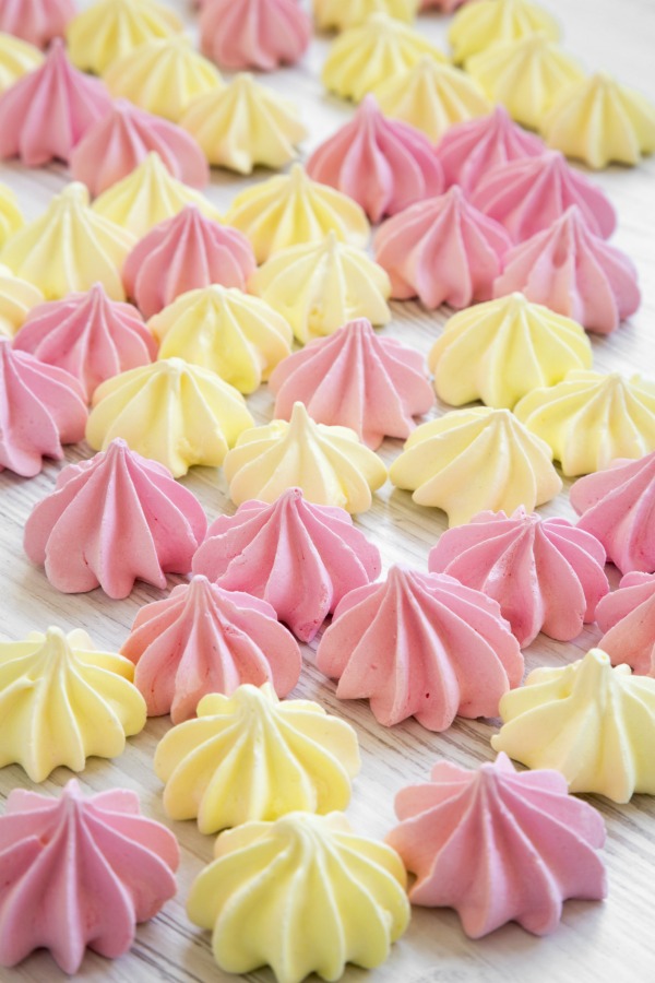 Meringue cookies on wood surface