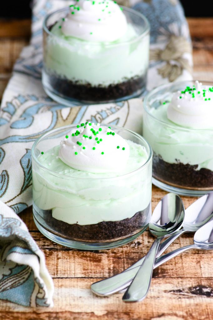 Grasshopper Pie Cheesecakes on wooden table