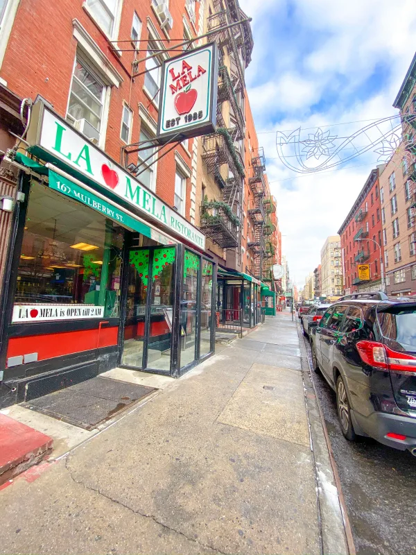 La Mela Italian restaurant exterior in Little Italy New York City