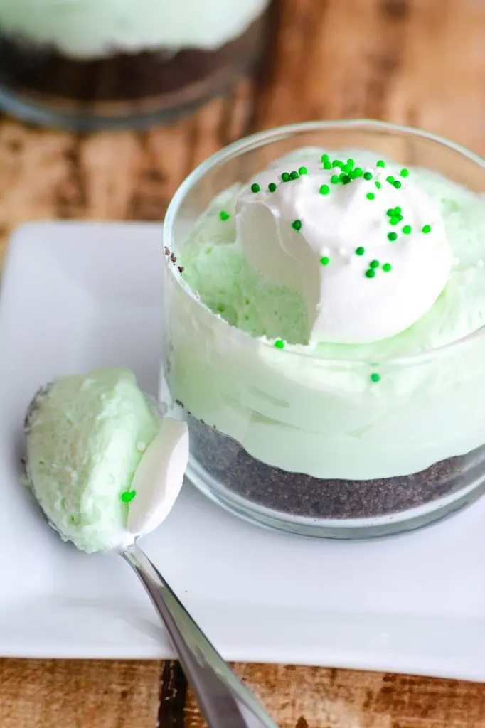 Mini Oreo Mint Cheesecake with spoon taken out