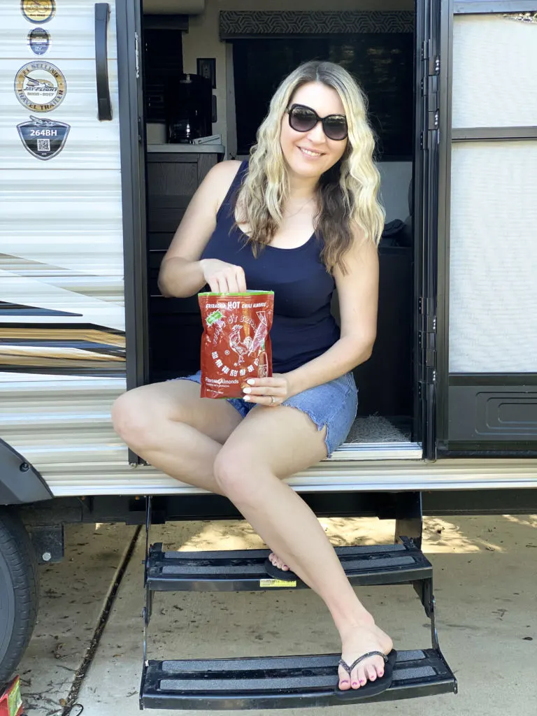 woman holding keto almond snacks